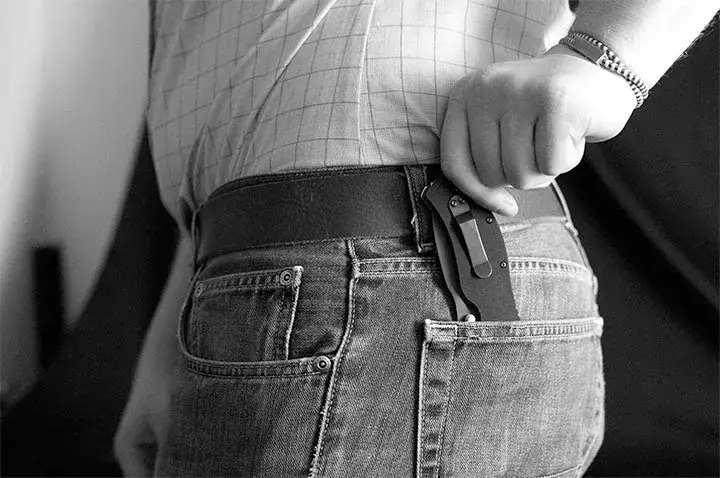 ZT knife in back left pocket
