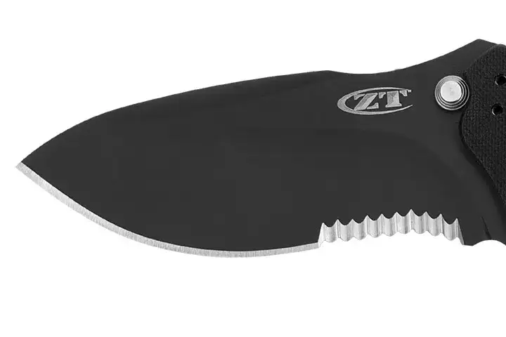 Partially serrated edge knife blade. Described under the heading The partially serrated edge.